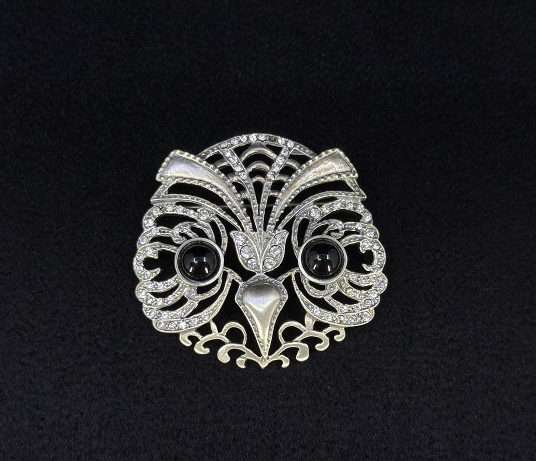 Metropolitan Museum of Art Sterling Owl Brooch: Night Owl. 18.16 grams. 1 3/4" long.