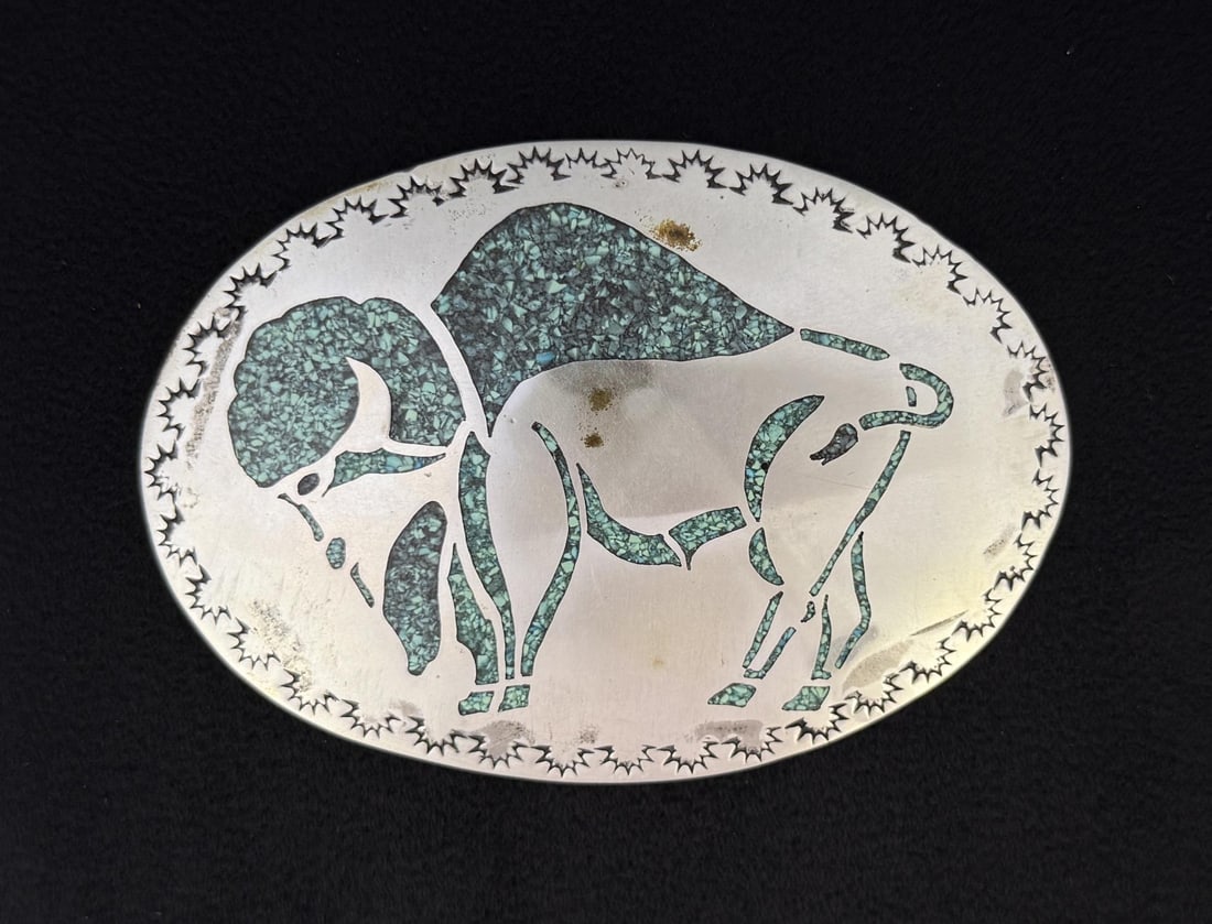 Navajo Sterling Silver Buffalo Inlaid Belt Buckle: 89 grams. 2 1/2" by 3 5/8".