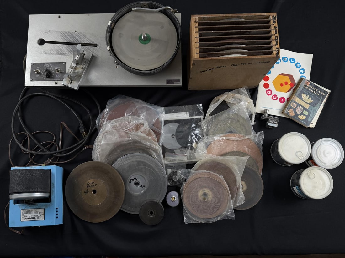 Ultra Tec V2 Faceting Machine and Wheels: Includes a large number of wheels, and a Lortone tumbler. Both machines are working.