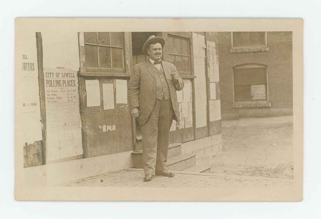 Lowell Massachusetts Political RPPC Postcard: Man standing in front of a Political Broadside, holding a cigar.