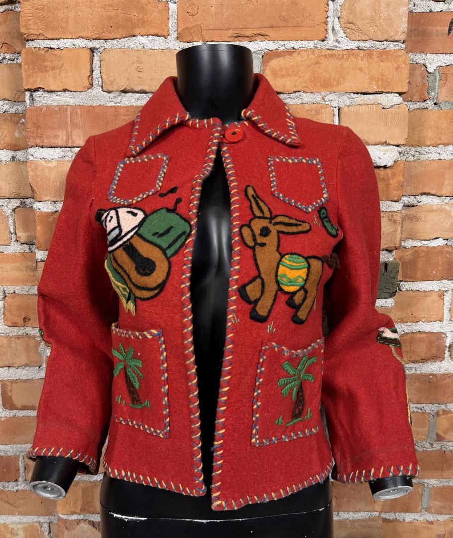 Vintage 1950's Mexican Souvenir Jacket: 17" armpit to armpit, 20" long, 13" shoulder to shoulder.