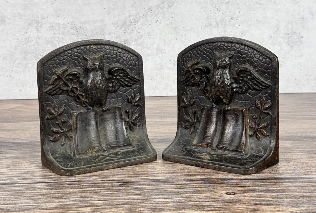 Cast Iron Wisdom & Medicine German Bookends: 5 1/4" by 5" by 2 1/4"