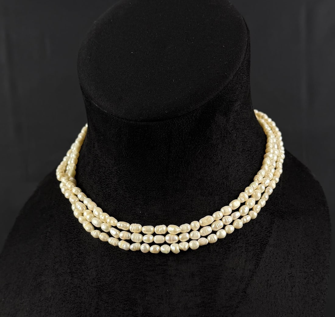 Freshwater Pearl Tristrand Necklace: 8 1/4" long closed.