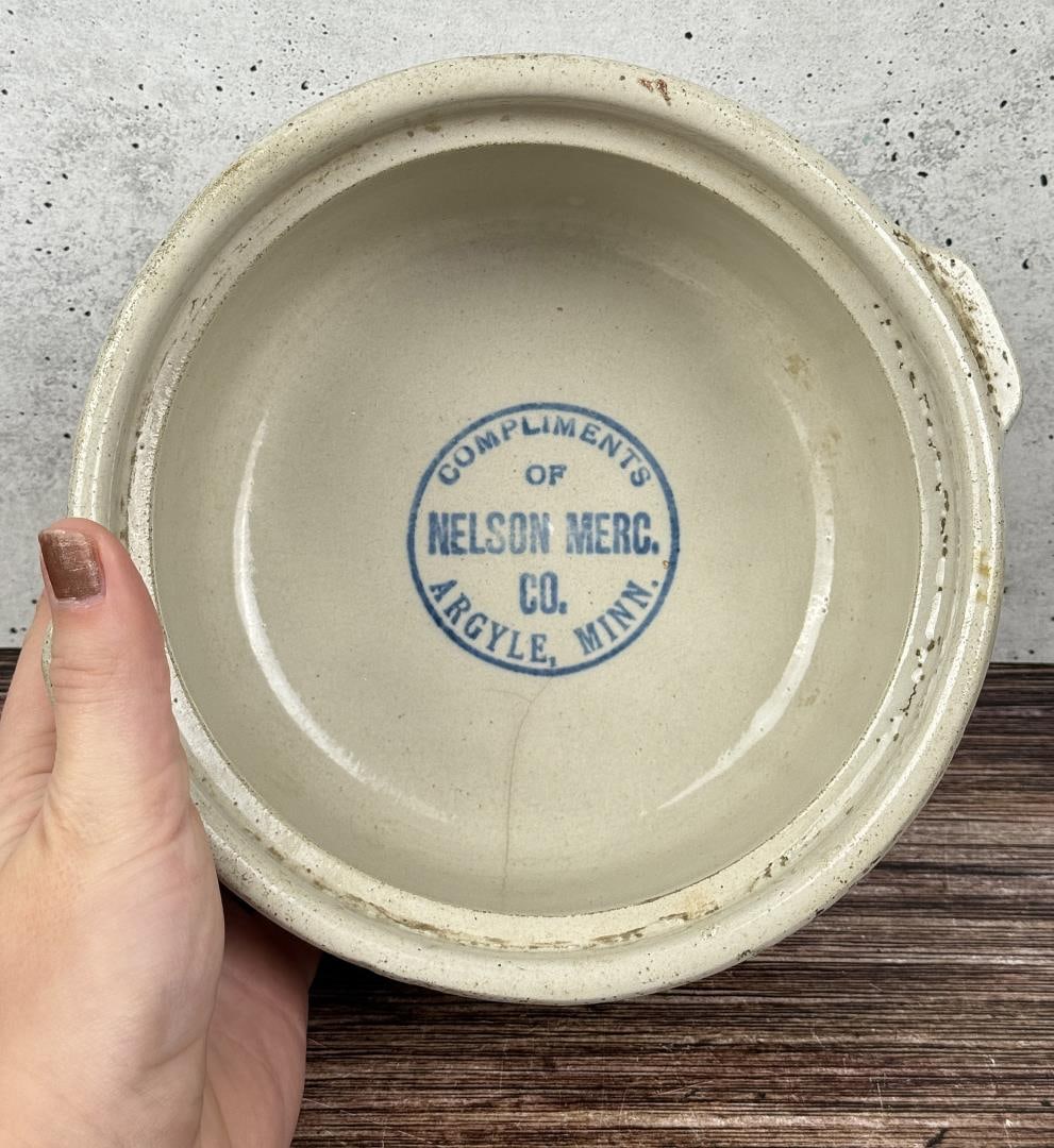 Red Wing Stoneware Casserole Argyle Minnesota: 7 1/4" by 7 1/4" by 3 7/8". Nelson Mercantile Co. Has a hairline crack and missing lid.