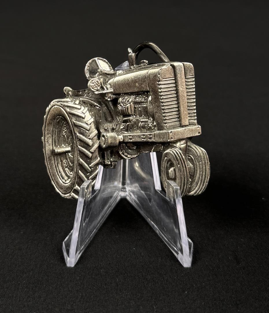 Great American Chicago Buckle Co Tractor Buckle: 2" by 2". Serial number 243. 1981.