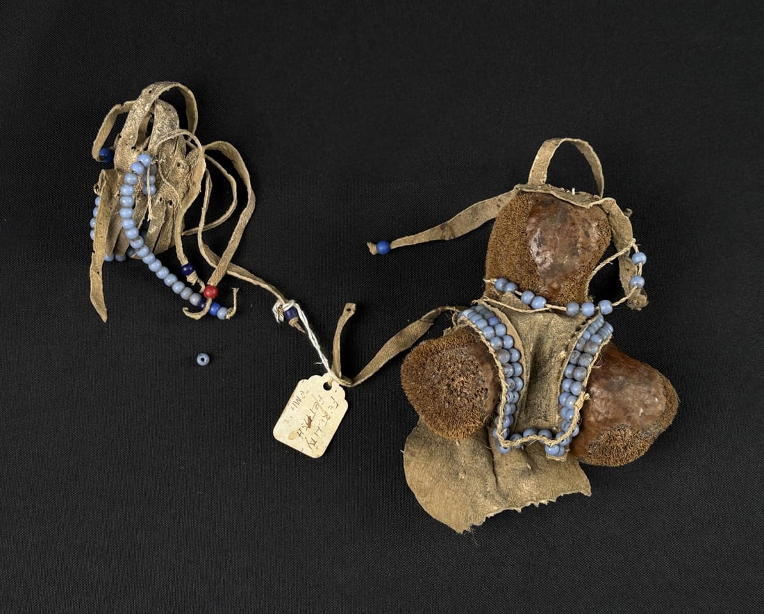 Turkana Ngide Ikoku 3 Lobed Fertility Doll: 5 1/4" by 5 1/4" by 2 1/4". 20th century. Kenya.
