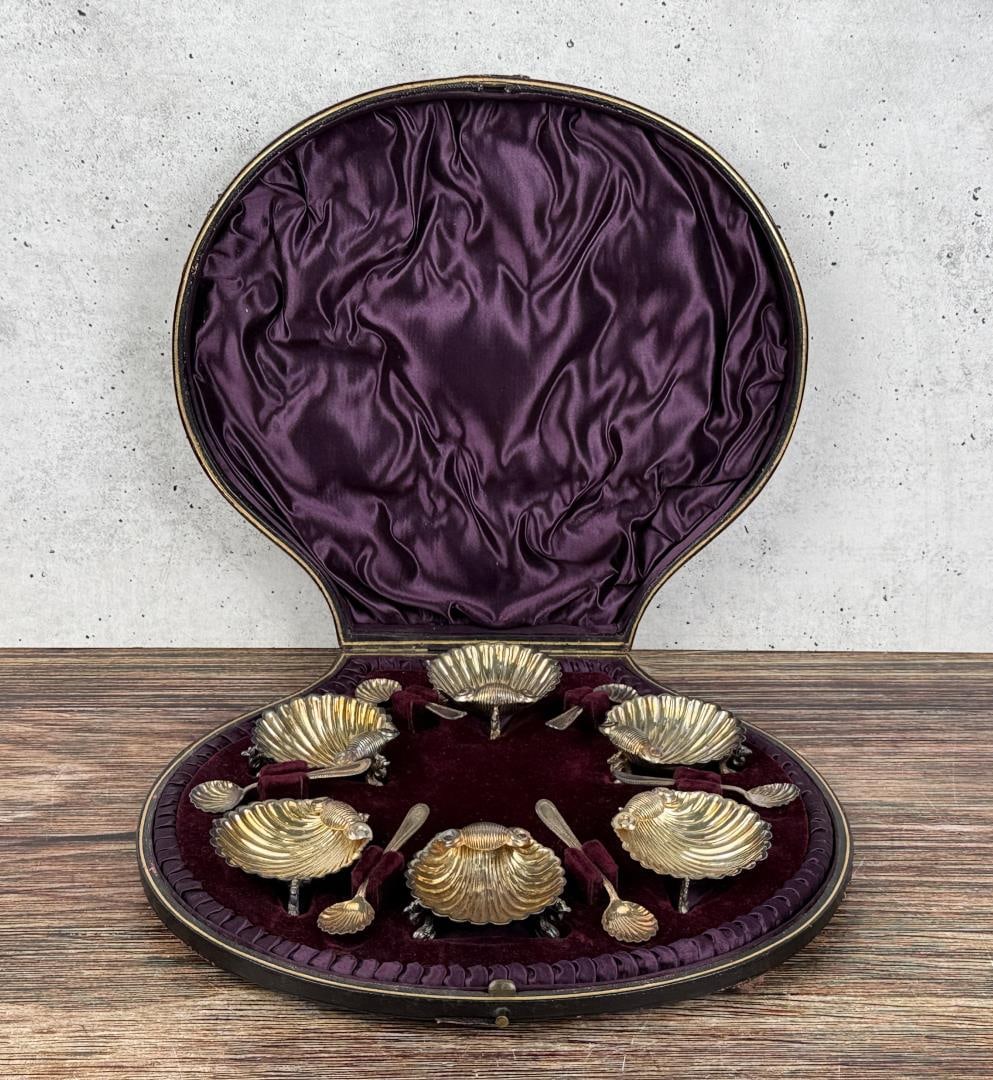 Victorian Seashell Salt Cellars and Case: 10 1/4" by 9 1/2" by 2". Case has some damage as shown. Silver Plated.