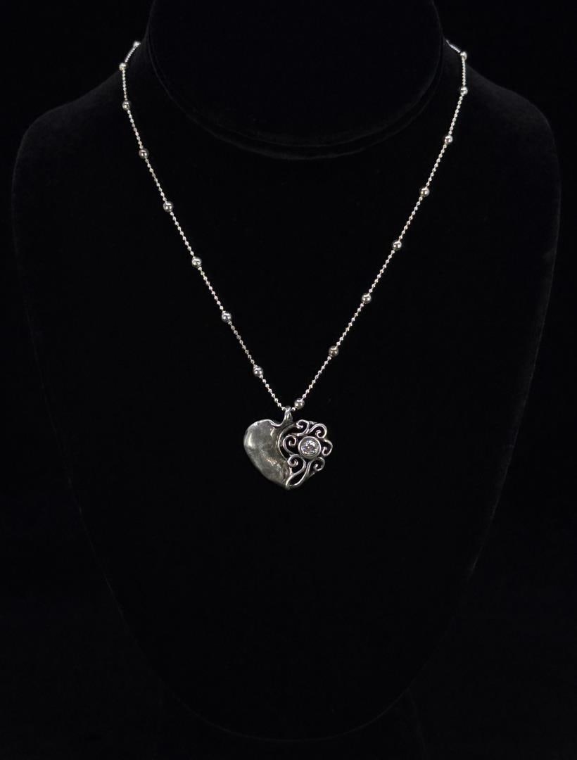 Didae Sterling Silver Heart Necklace: 9 3/8" long closed. 7.97 grams.