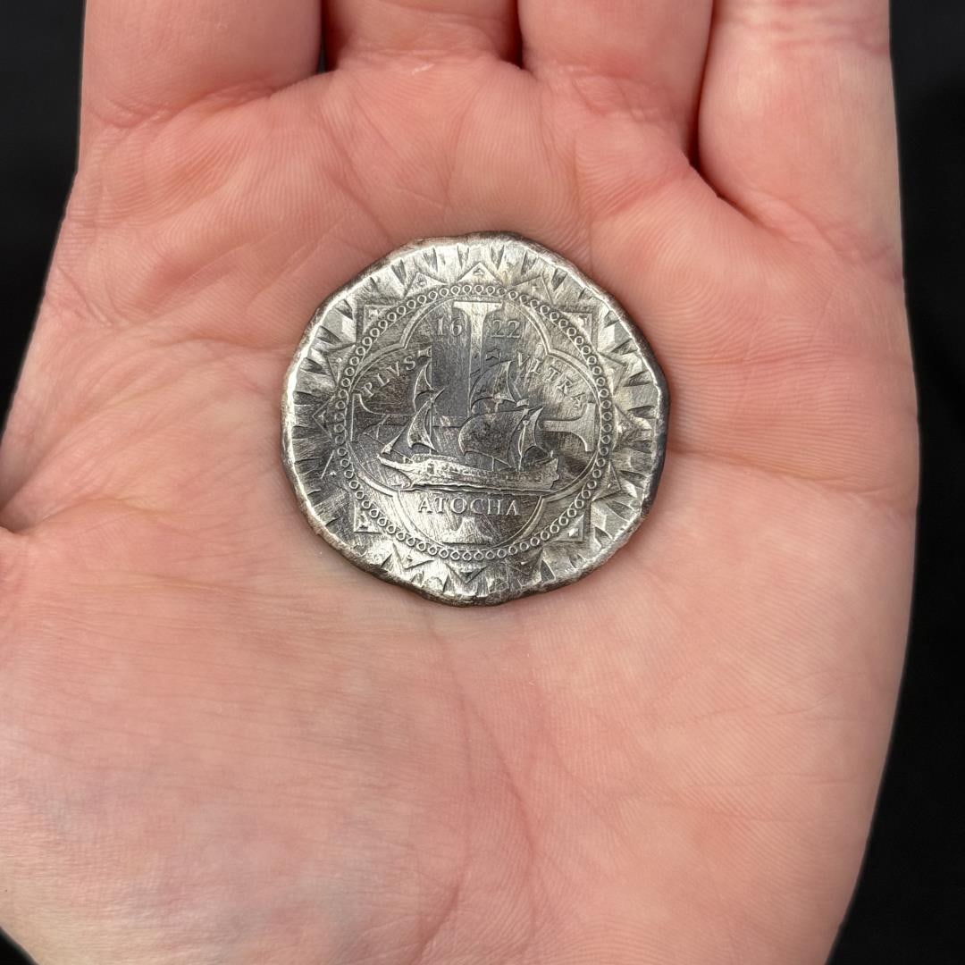 1622 Atocha 8 Reales Cobb Silver Round: Modern commemorative 1622 Atocha Silver Cob round, designed by Daniel Carr and struck by the Moonlight Mint, which contains trace amounts of silver recovered from the actual 1622 shipwreck.