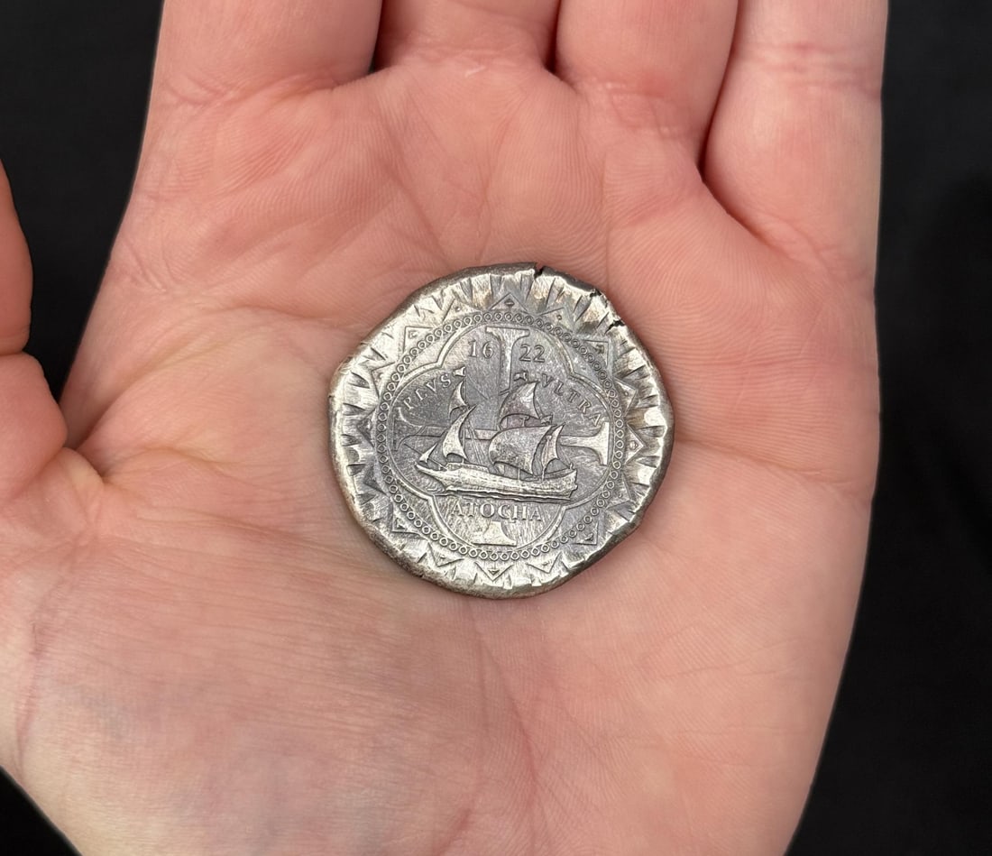 1622 Atocha 8 Reales Cobb Silver Round: Modern commemorative 1622 Atocha Silver Cob round, designed by Daniel Carr and struck by the Moonlight Mint, which contains trace amounts of silver recovered from the actual 1622 shipwreck.
