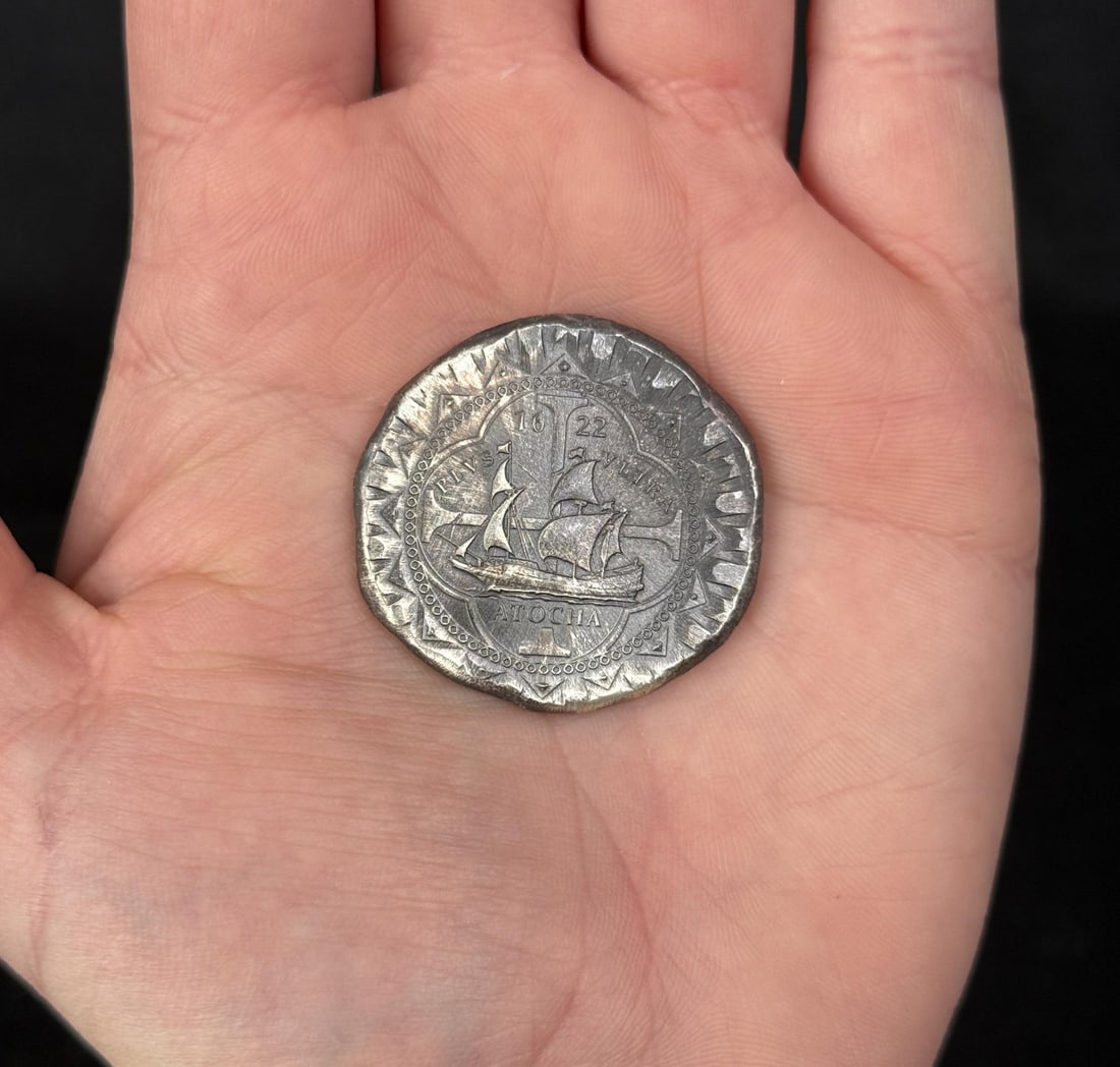 1622 Atocha 8 Reales Cobb Silver Round: Modern commemorative 1622 Atocha Silver Cob round, designed by Daniel Carr and struck by the Moonlight Mint, which contains trace amounts of silver recovered from the actual 1622 shipwreck.