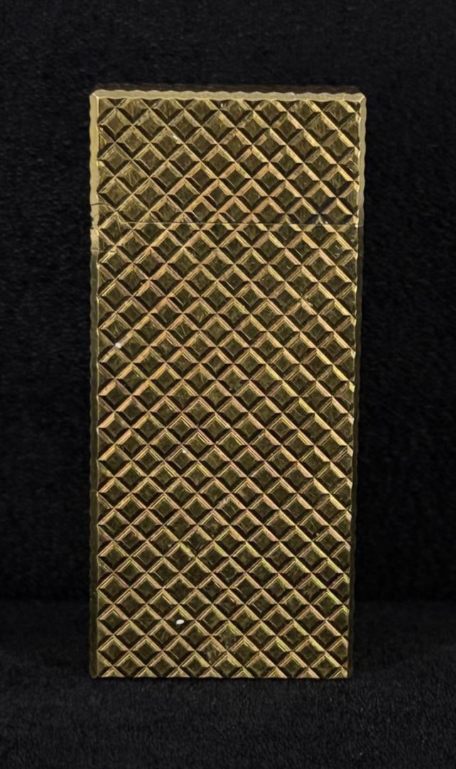 Bronica Lighter: 2 1/4" by 1" by 1/4".