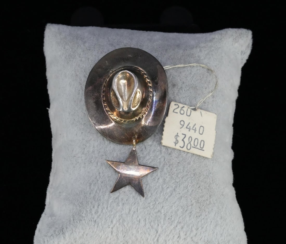 Taxco Sterling Silver Cowboy Hat Brooch: Old tag from Scarbrough. 5.24 grams. 1" by 2"