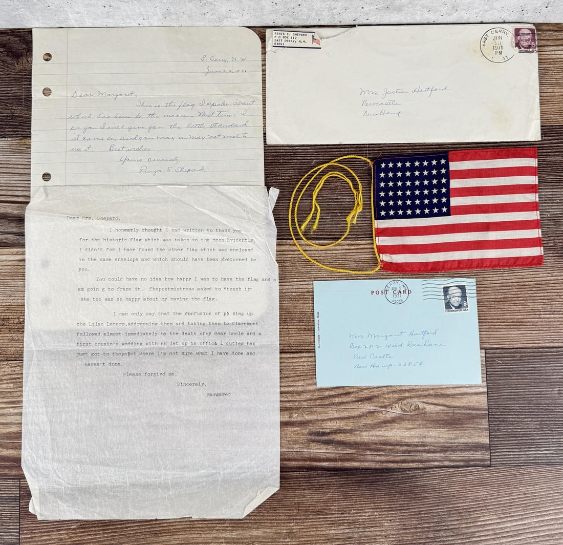 Alan Shepard Apollo 14 Lunar Flown American Flag: Truly a phenomenal piece of American History. This flag was flown on board Apollo 14 and Carried by Alan Shepard. The flag has communication regarding its chain of ownership between Margaret Hartford