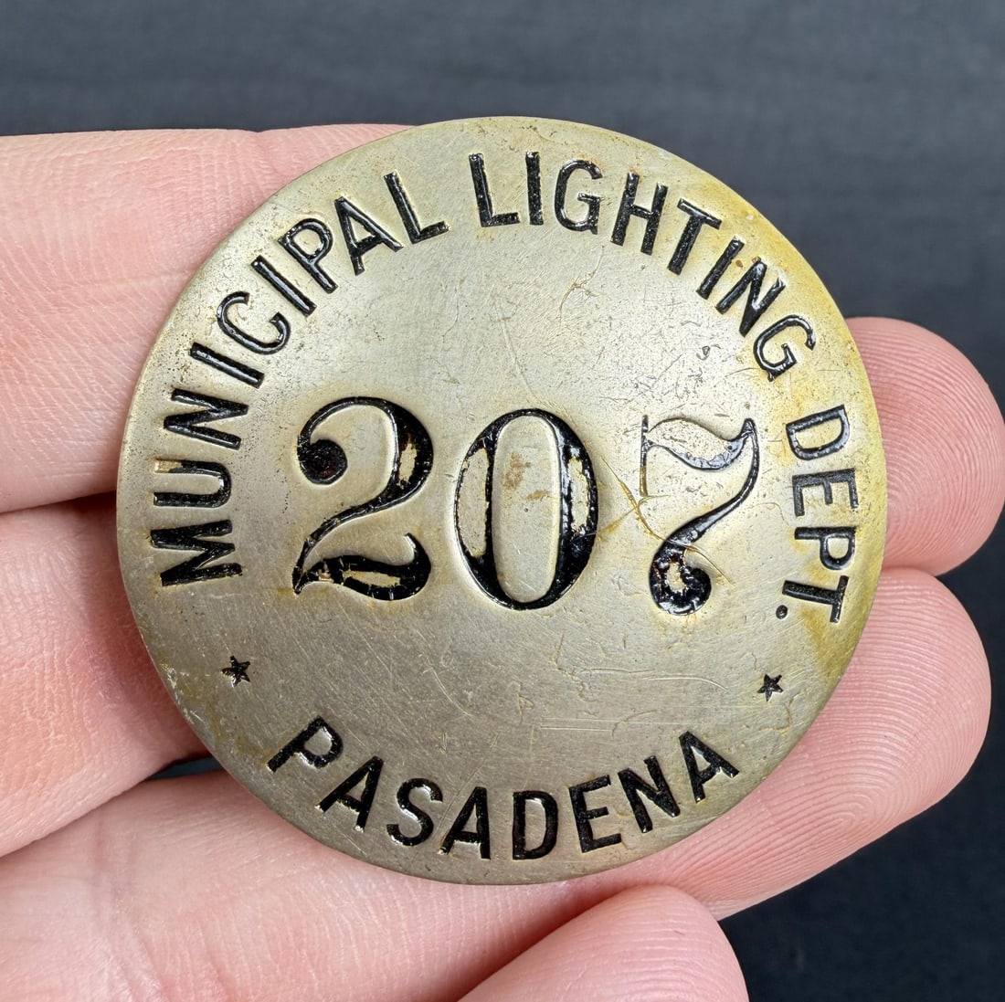 Municipal Lighting Dept Pasadena California Badge: 1 5/8" diameter. Pasadena Municipal Lighting Works Department: The Pasadena Water and Power Department (PWP) was originally established as the Pasadena Municipal Lighting Works Department in 1906.
