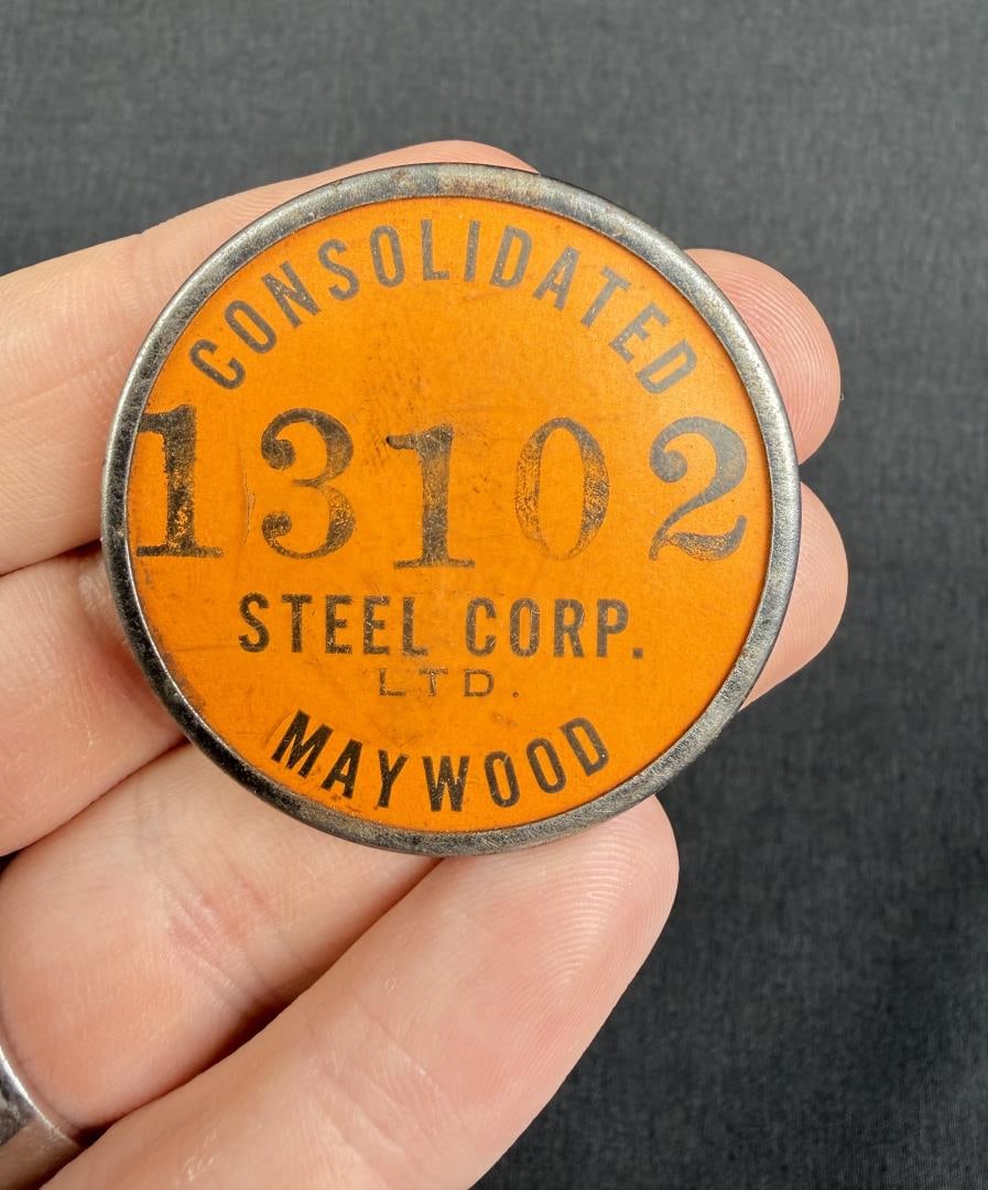 WW2 Consolidated Steel Maywood California Badge: 1 5/8" diameter. The Consolidated Steel Corporation was an American steel and shipbuilding business. Formed on 18 December 1928, the company built ships during World War II in two main locations: Wilm