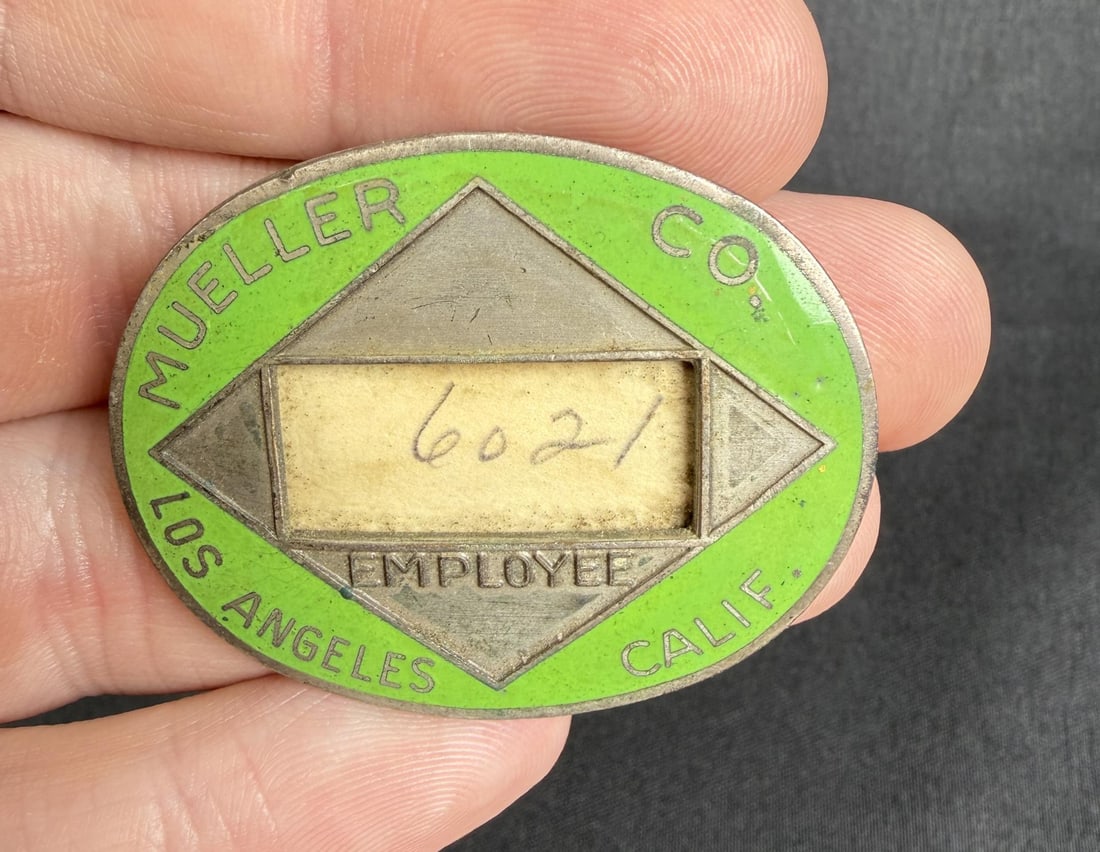 Mueller Co Los Angeles California Employee Badge: 1 1/2" by 1 3/4"