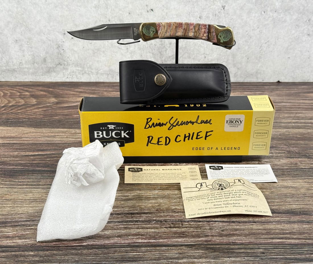 Buck 110 Custom Brian Yellowhorse Red Chief Knife: Satin finish 420HC stainless clip point blade. Has not been used or carried. Knife inlays by Navajo artist Brian Yellowhorse. Red mammoth tooth handle. 4 7/8" long closed.