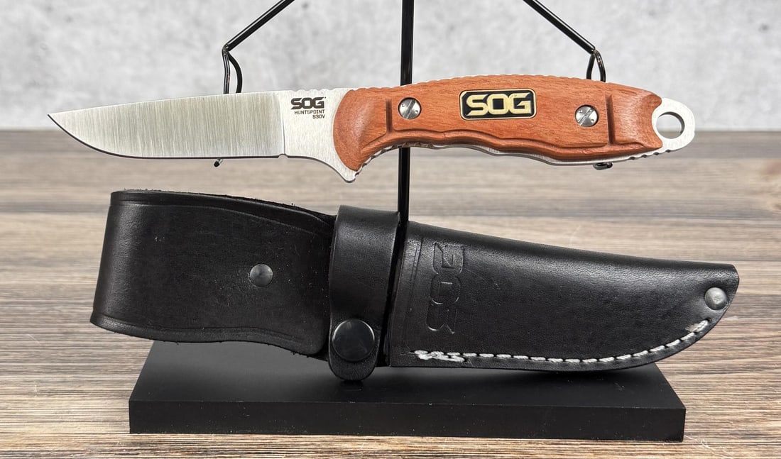 SOG Huntspoint Hunting Knife: 8" long. S30V stainless steel blade. Model number HT023L. Never used or carried