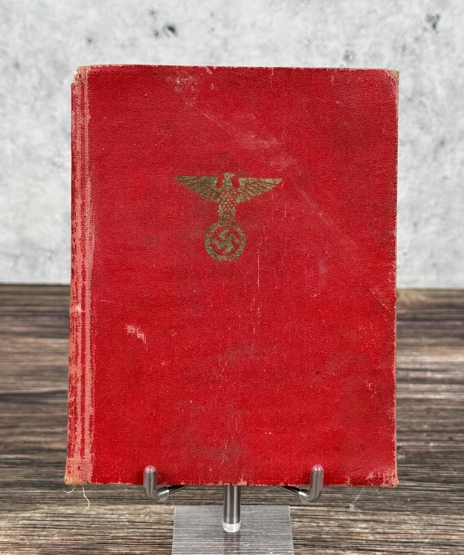 WW2 German NSDAP Membership Book: 8 stamps in book.