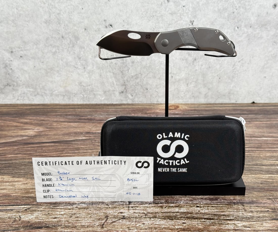 Olamic Tactical Busker B152-L Pocket Knife: Never used or carried. 3 1/2" long closed.