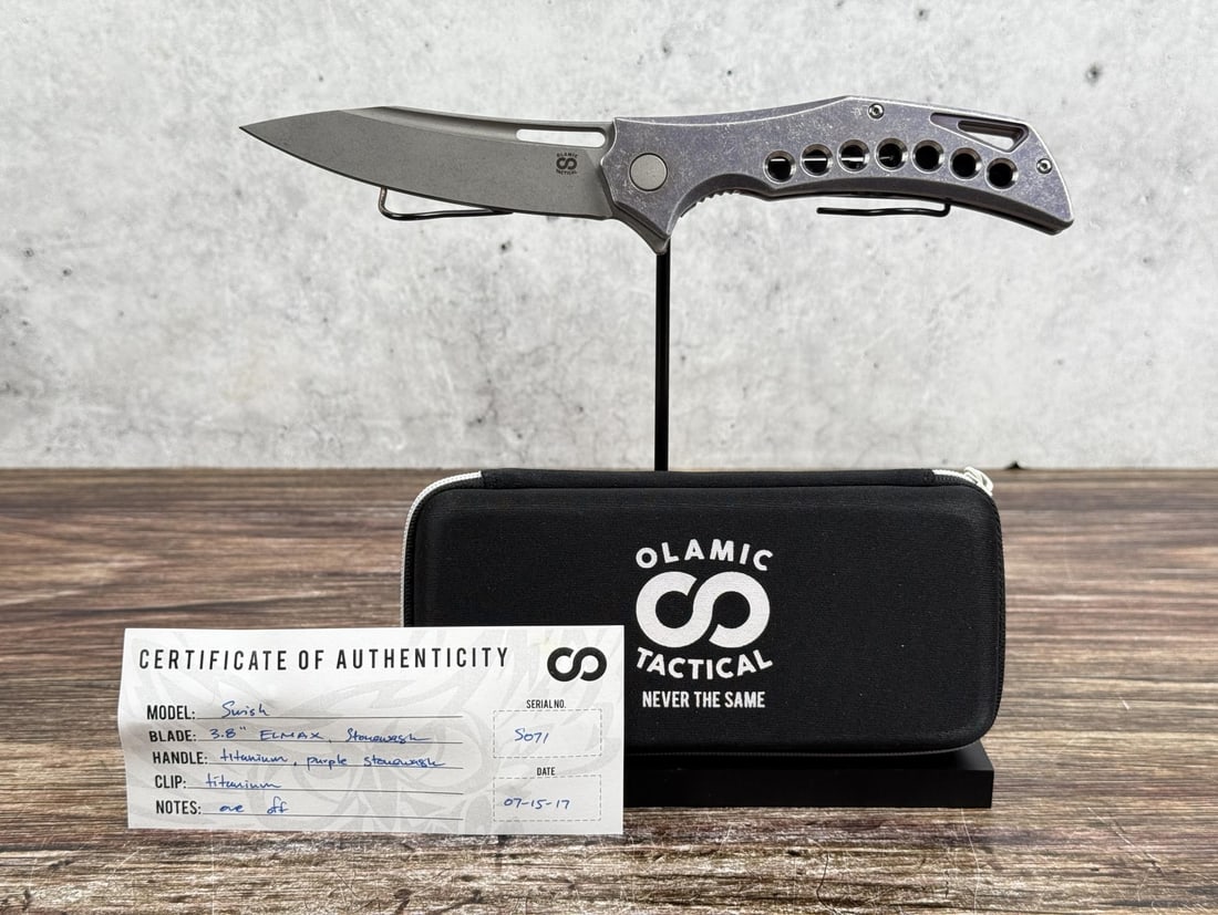 Olamic Tactical Swish S071 Pocket Knife: Never used or carried. 4 7/8" long closed.