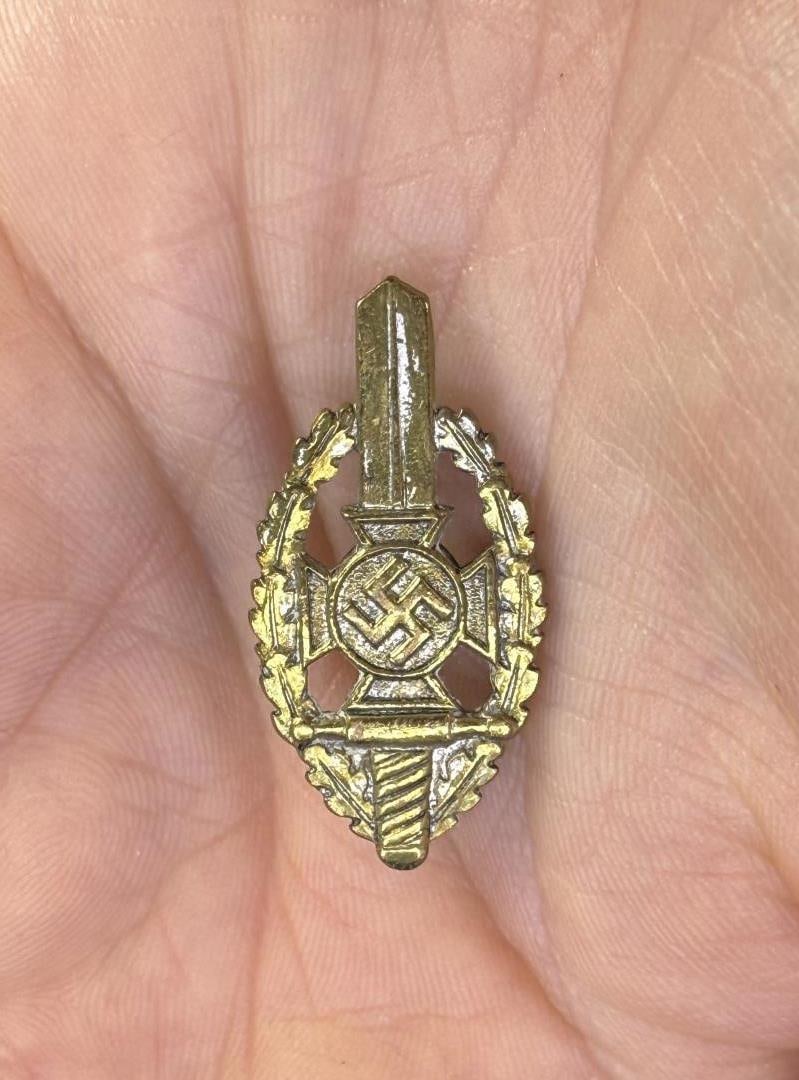 WW2 German NSKOV Wounded Veteran Pin: Nice example. National Socialist War Victim's Care