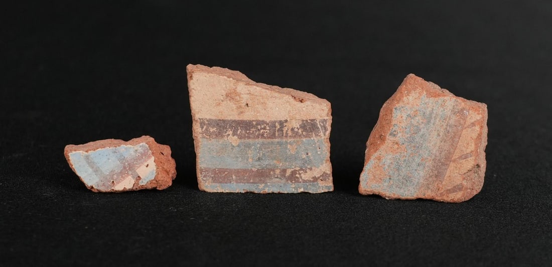 Ancient Egyptian Painted Amarna Pottery Fragments: Largest: 1" by 1/2". From Tell El Amarna, May 1976. Amarna Period, Reign of Akhenaten, 1353-1335 B.C. Provenance: From the estate of Andrew Cunningham Ware. Andrew Cunningham Ware Collection (1945?202