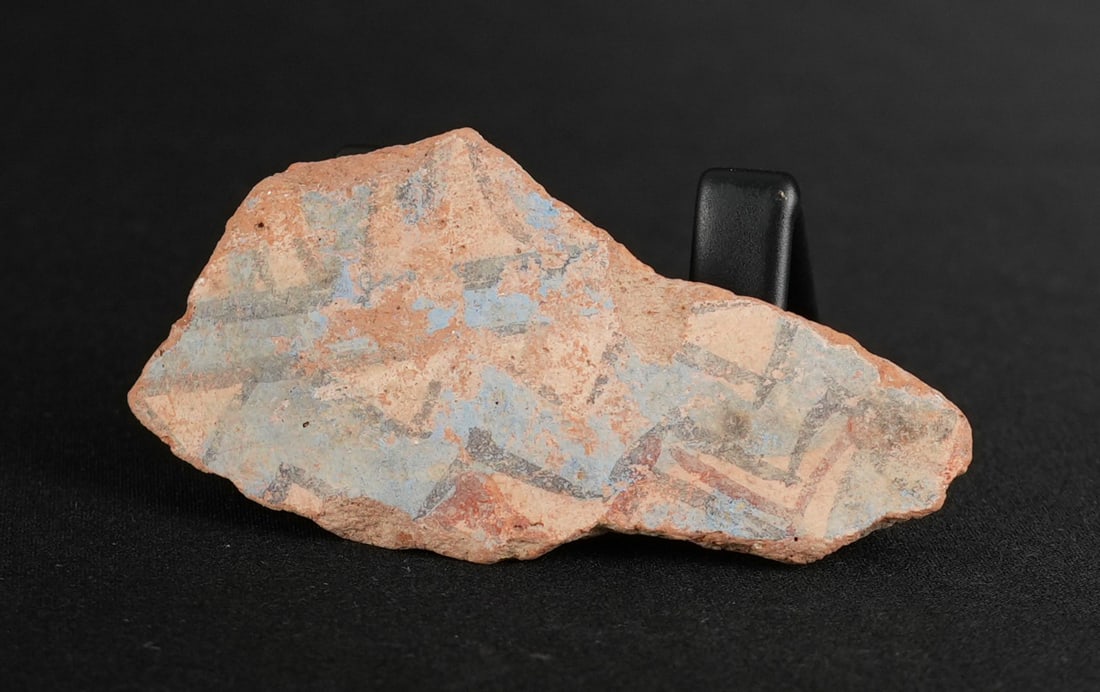 Ancient Egyptian Painted Amarna Pottery Fragment: 2 7/8" by 1 1/2" by 7/8". From Tell El Amarna, May 1976. Amarna Period, Reign of Akhenaten, 1353-1335 B.C. Provenance: From the estate of Andrew Cunningham Ware. Andrew Cunningham Ware Collection (194