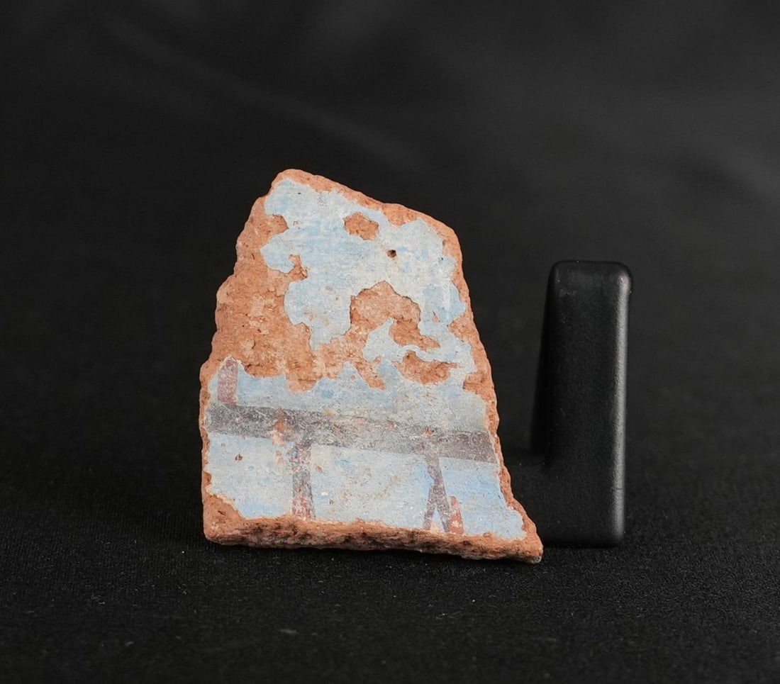Ancient Egyptian Painted Amarna Pottery Fragment: 1 7/8" by 1 1/2" by 1/4". From Tell El Amarna, May 1976. Amarna Period, Reign of Akhenaten, 1353-1335 B.C. Provenance: From the estate of Andrew Cunningham Ware. Andrew Cunningham Ware Collection (194
