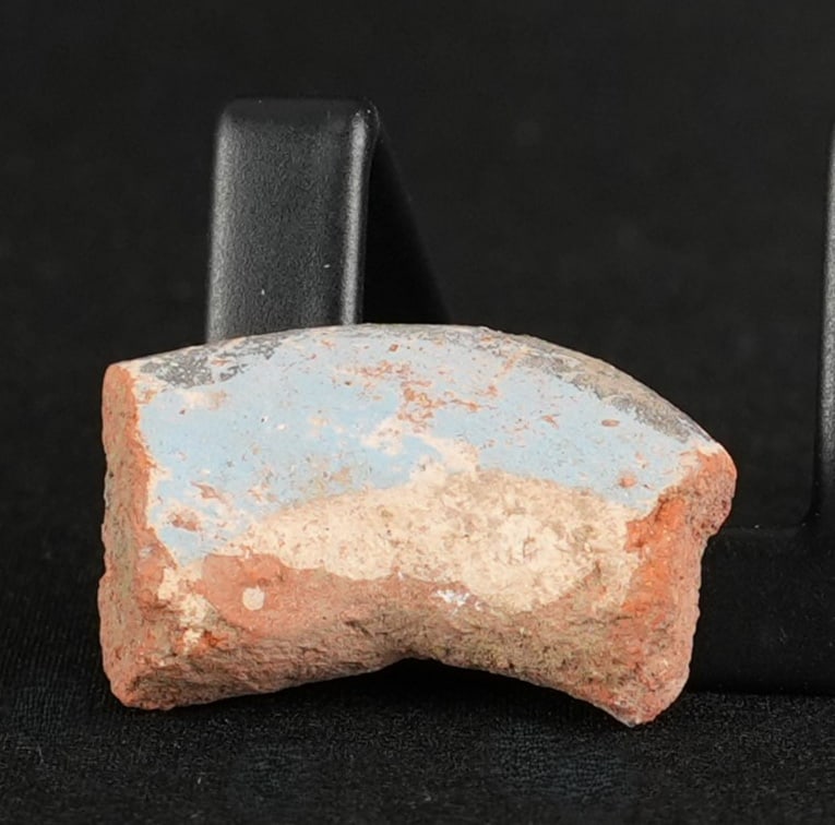 Ancient Egyptian Painted Amarna Pottery Fragment: 1 1/4" by 7/8" by 1/2". From Tell El Amarna, May 1976. Amarna Period, Reign of Akhenaten, 1353-1335 B.C. Provenance: From the estate of Andrew Cunningham Ware. Andrew Cunningham Ware Collection (1945?