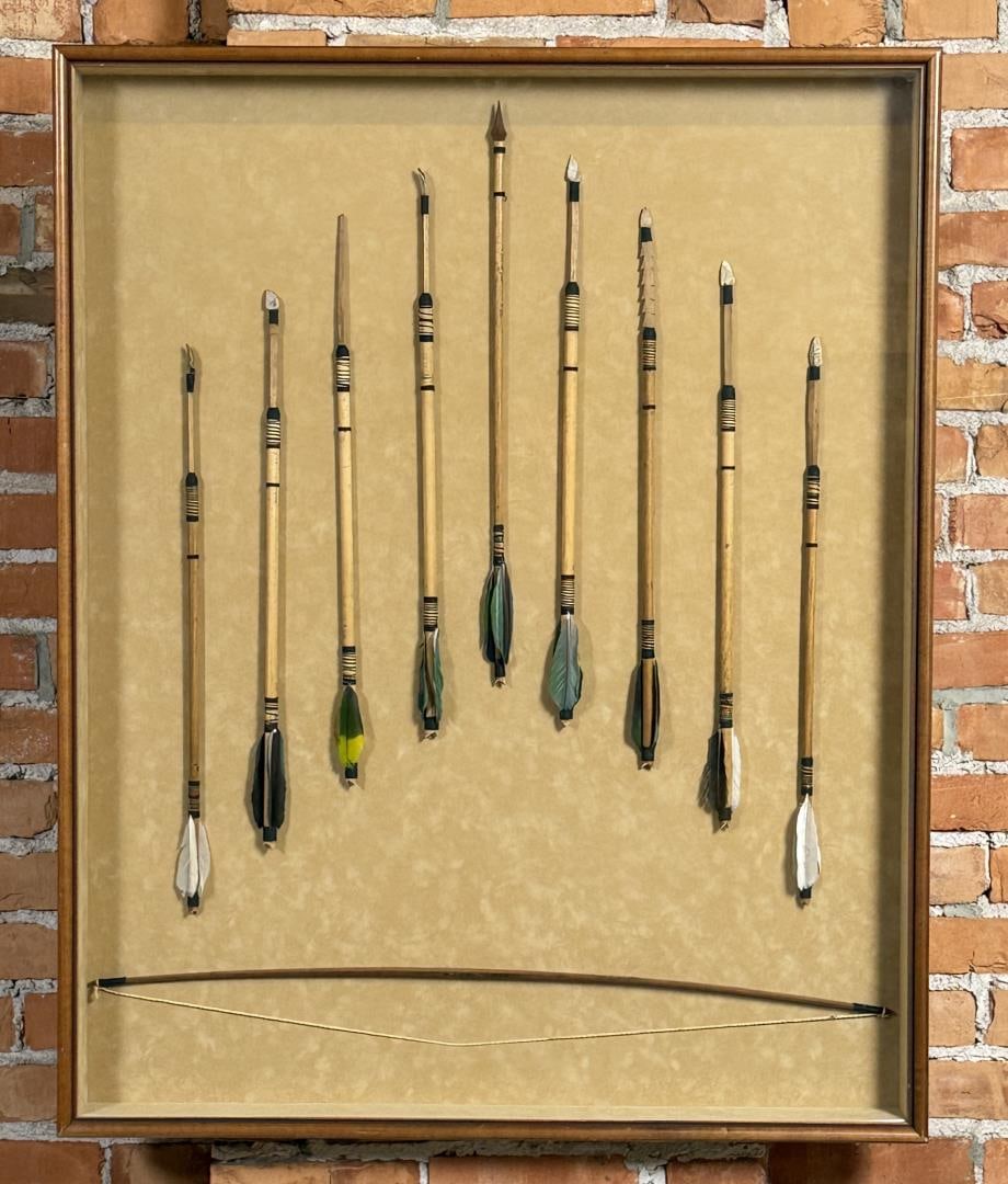 Lacandon Maya Bow and Arrow Display: 41 1/2" by 33 1/2" framed. Provenance: The Esteemed Trophy Room of Robert Narotzky, Bozeman, Montana.