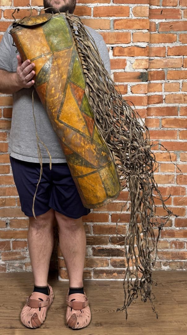 Parfleche Native American Indian Bonnet Case: Blackfoot. 6 1/2" by 10" by 32" long. First Half of the 20th Century.