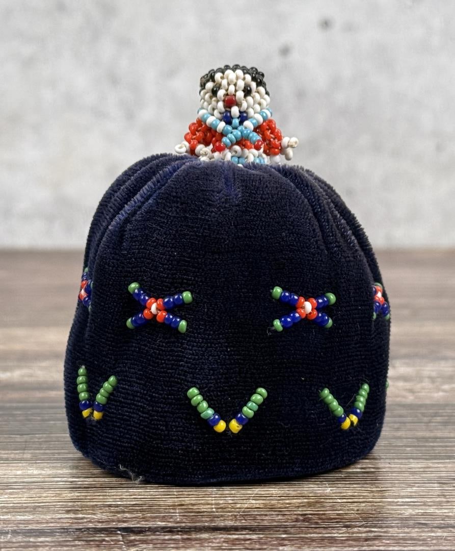 Zuni Pueblo Beaded Pin Cushion Doll: 3 1/4" by 2 7/8" by 2 7/8". Mid 20th century.