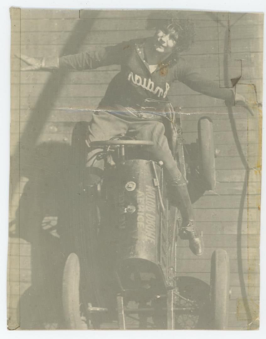 Lillian LaFrance Motor Drome Stunt Rider Photo: Lillian is Wearing an Indian Motorcycles Team Jersey, top of car reads AE Nice Motor Drome. She is sporting a tooled kidney belt. 5 3/4" by 6 3/4". Lillian La France (1894?1979) was billed as the