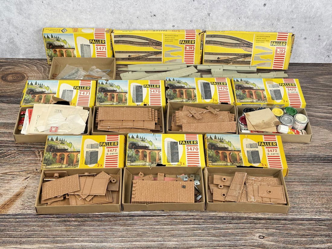 Collection of Faller Model Railway Kits: Includes bridge structures and track accessories. Model numbers are 5470, 5471, and 5472.