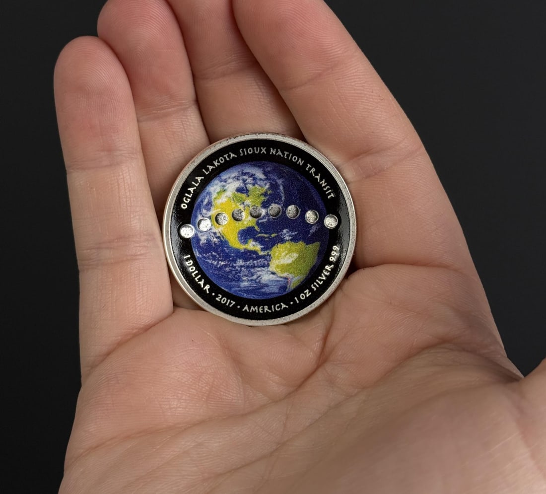 2017 Oglala Sioux Silver Ounce Coin: Curved earth and eclipse on reverse.