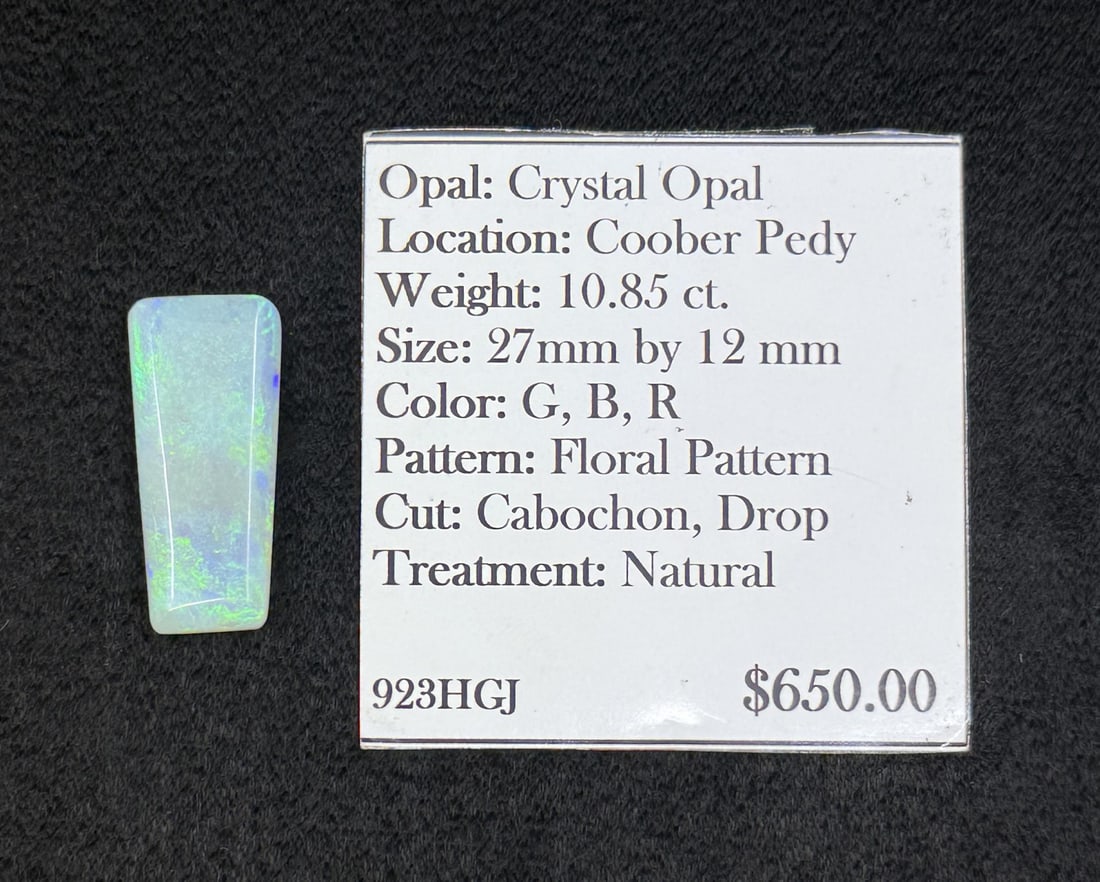 10.75ct Crystal Opal Cabochon Gemstone: 3/8" by 1". Coober Pedy Australia.