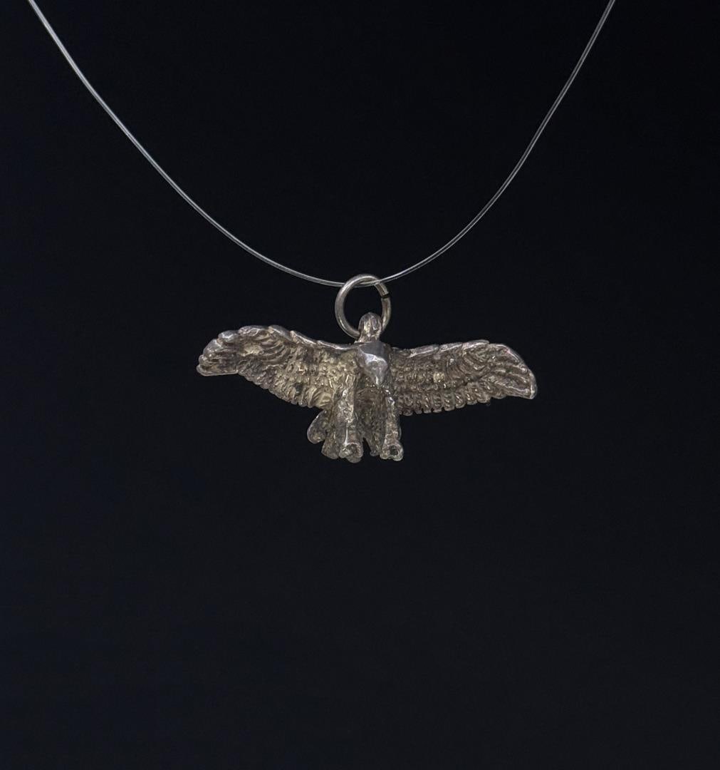 Sterling Silver Eagle Pendant: 3.10 grams. 1 1/4" wide.