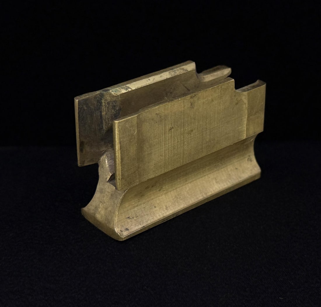 Winchester Model 1873 Carrier Block: Unmarked. 1 3/8" by 2 1/4".