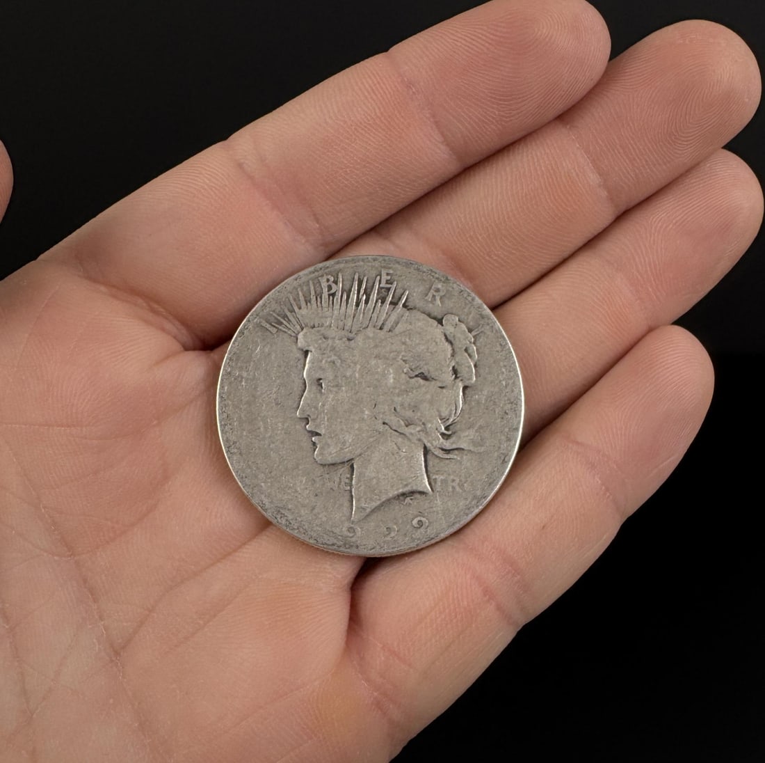 1922 P Silver Peace Dollar: Decent example.