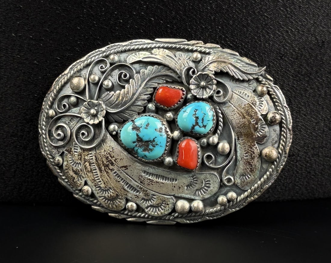 Navajo Sterling Silver Turquoise Belt Buckle: 3" by 2 1/4". 41.4 grams. Turquoise and coral.