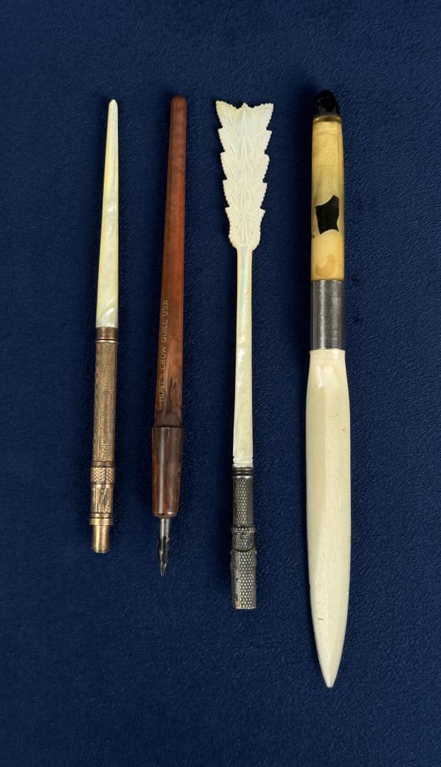 Collection of Fountain Pens: One is a nude floaty letter opener.