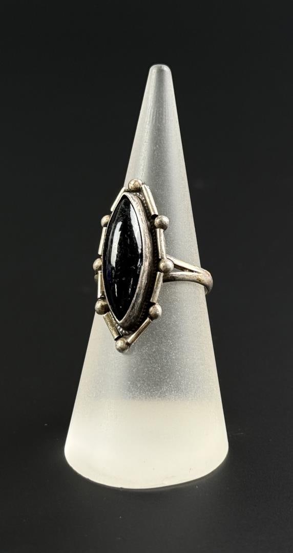 Navajo Sterling Silver Black Onyx Ring: Size 7. Marquise cut. 3.87 grams.