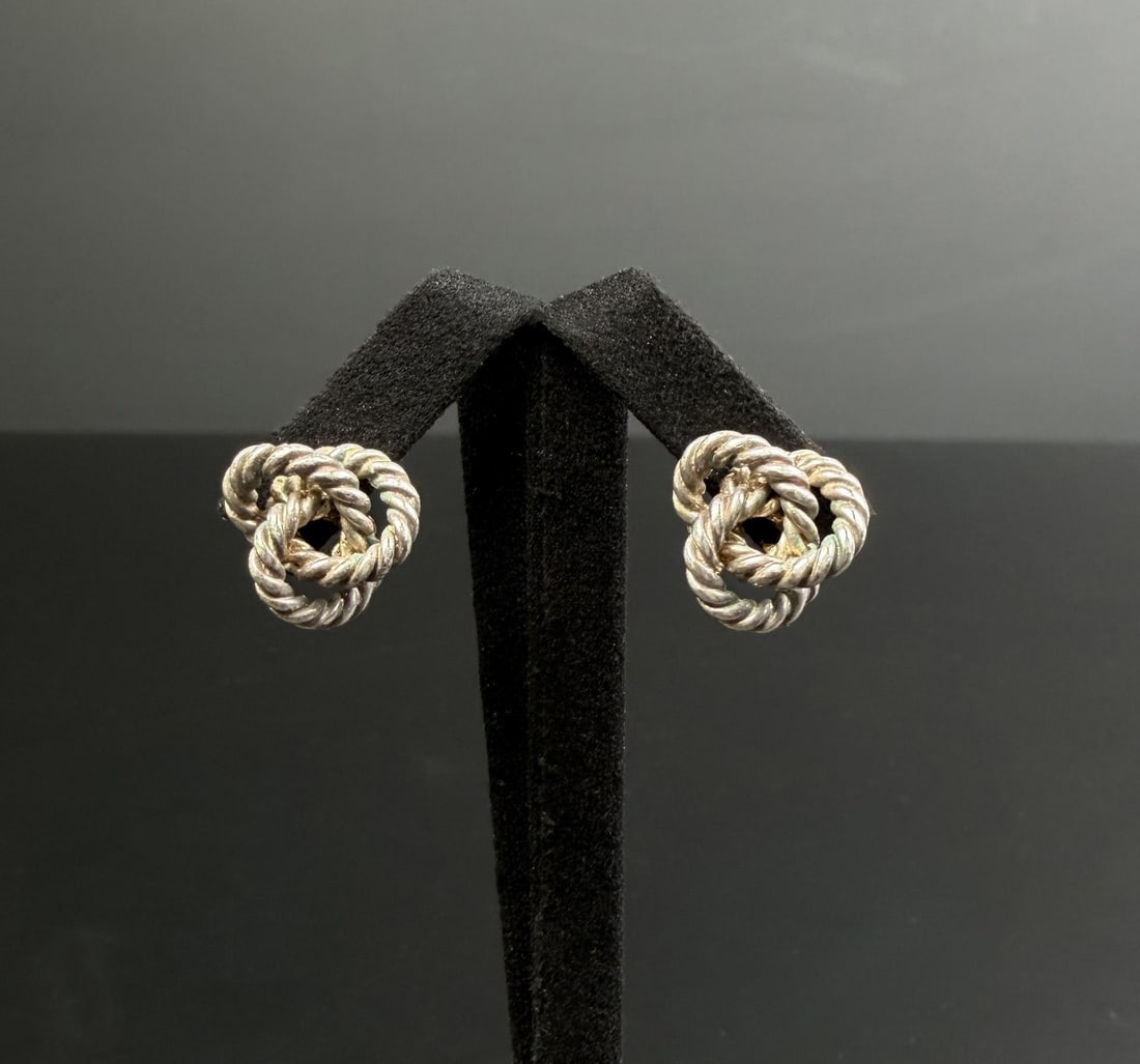 Tiffany & Co Sterling Silver Twist Knot Earrings: 1/2" by 1/2". 6.76 grams total weight.