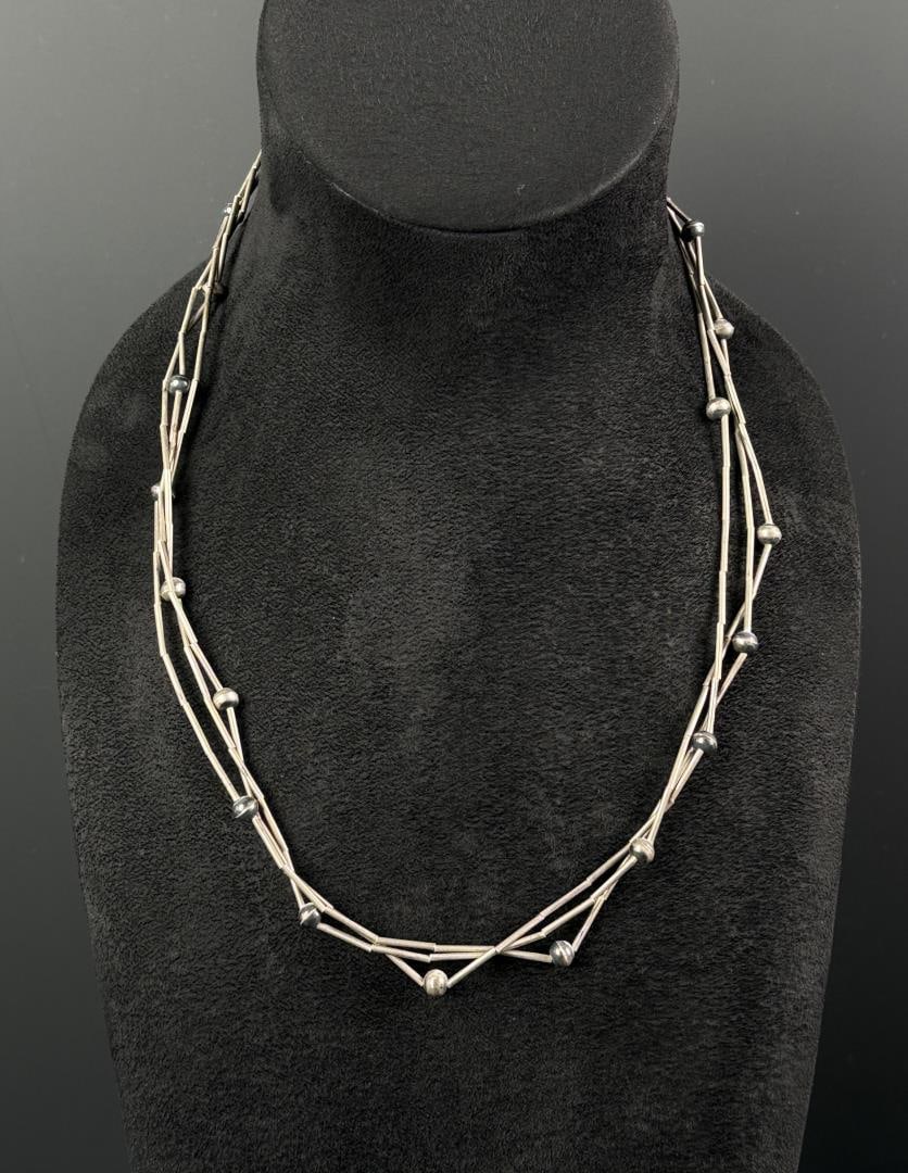 Navajo Sterling Liquid Silver Necklace: 12 1/4" long as displayed.