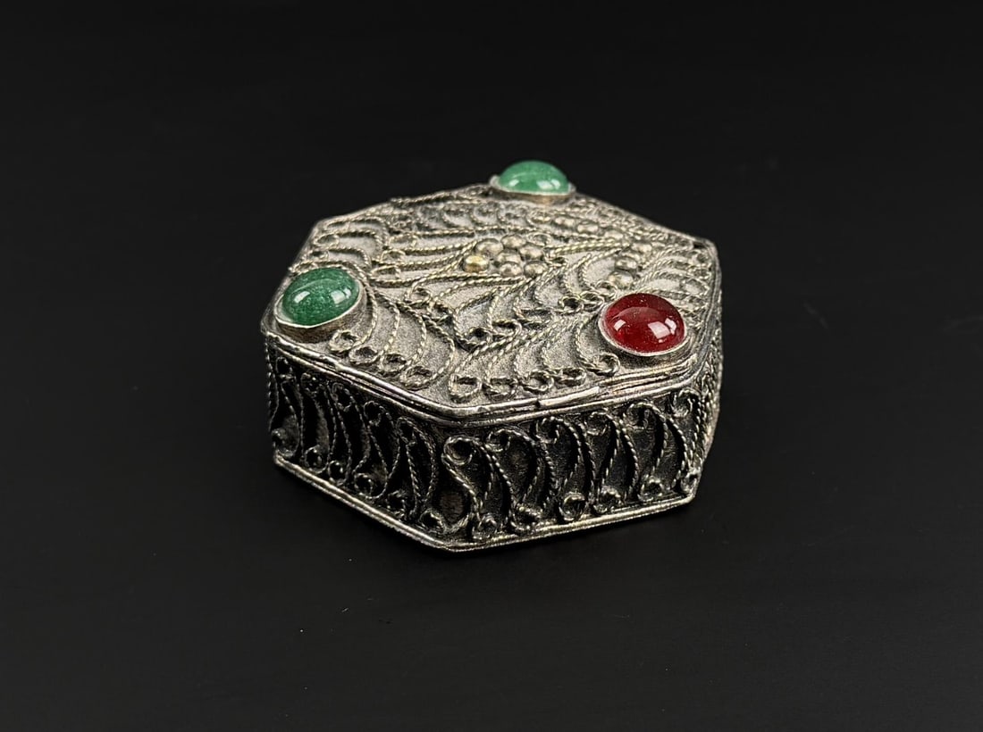 Moorish Jeweled Trinket Box: 2 5/8" by 2 5/8" by 7/8". Intricate filigree decorated with gemstones.