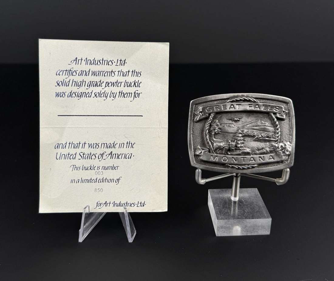 Art Industries Great Falls Montana Belt Buckle: 3" by 2 1/4". Pewter. Number 003/850. 1979.