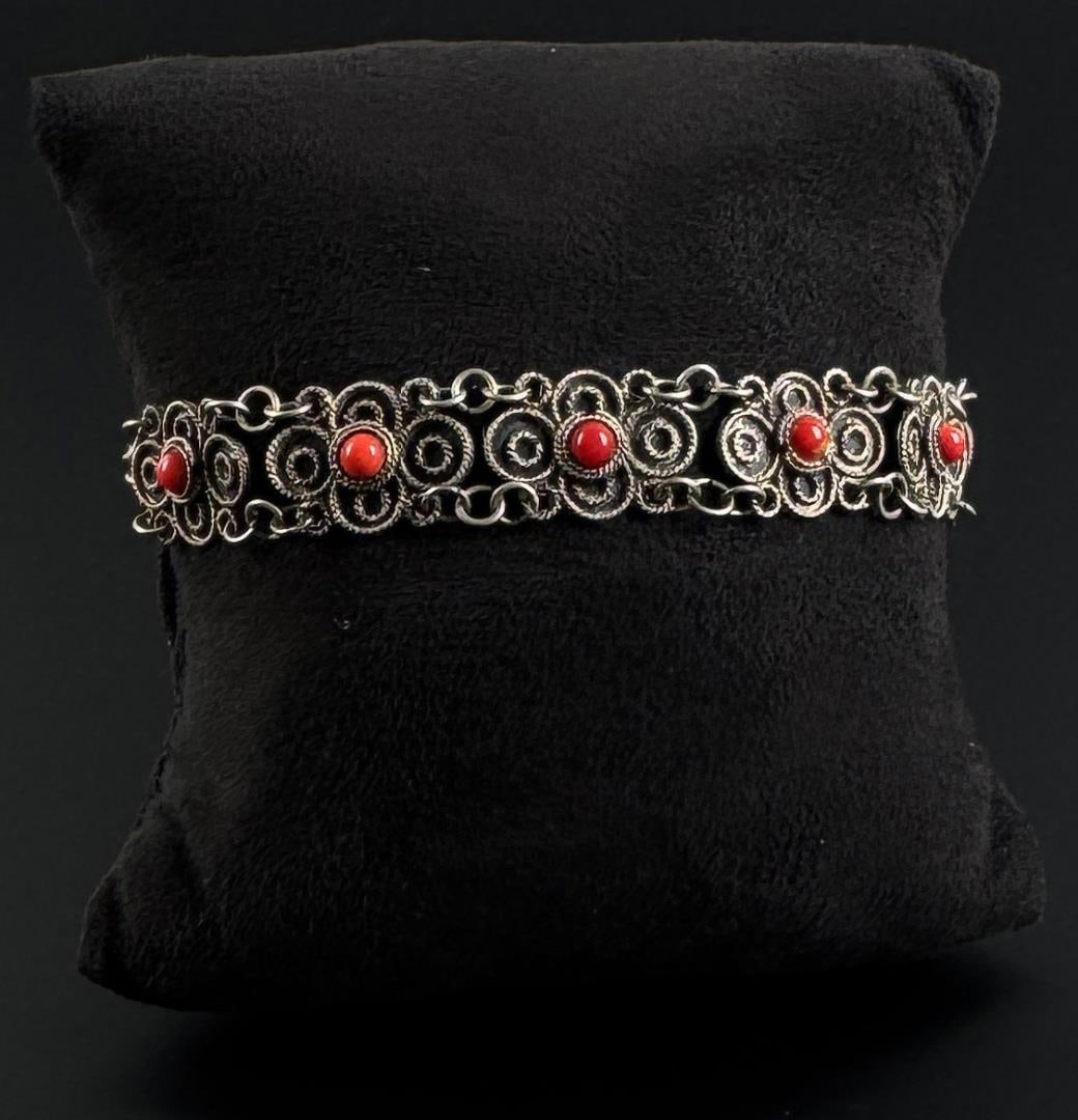 Sterling Silver Coral Bracelet: 7" interior circumference. 6.38 grams.