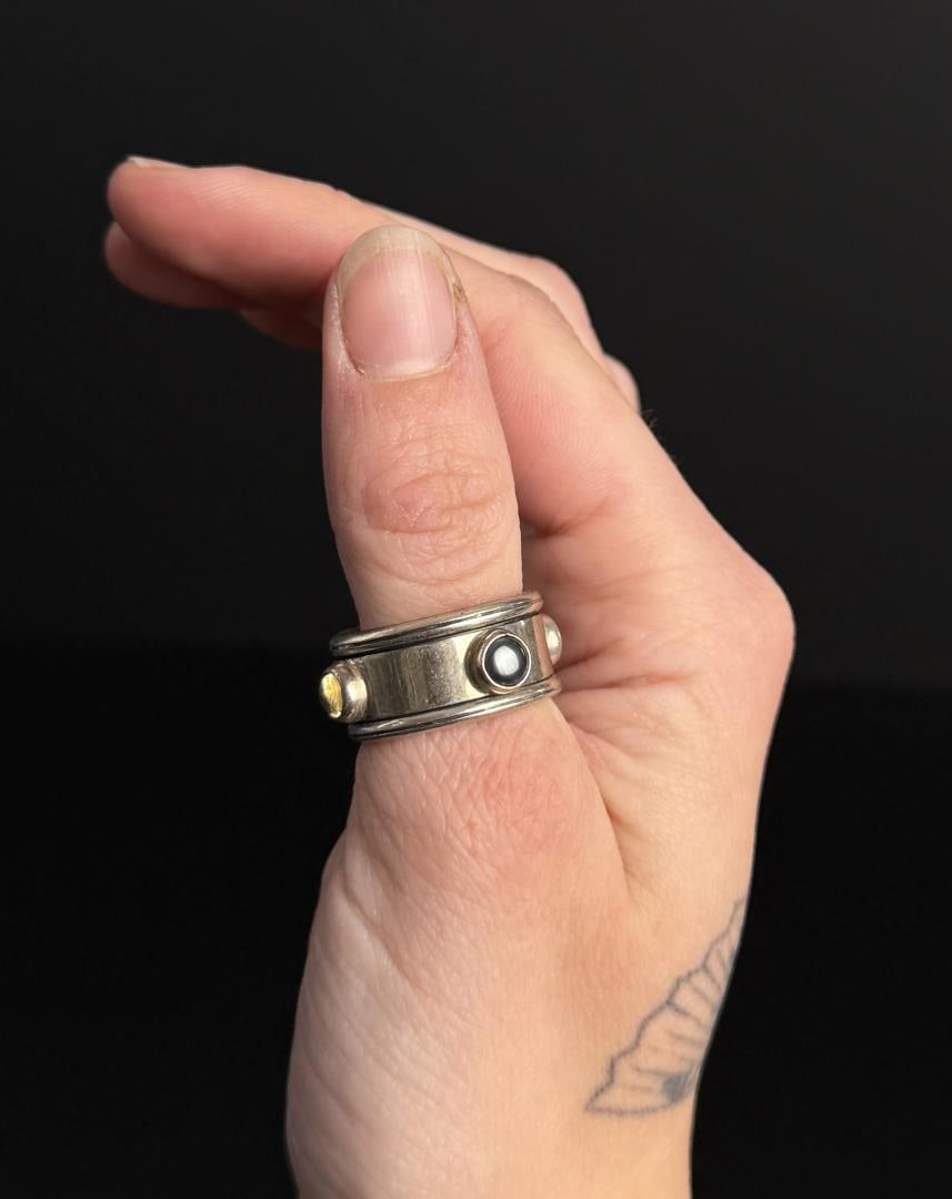 Sterling Silver Spinning Semi Precious Ring: 8.9 grams. Size 8